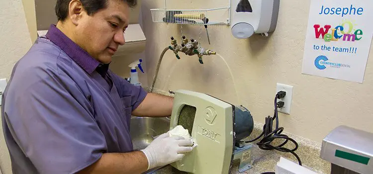 Country Club Dental Specialties northern arizona - person using dental equipment