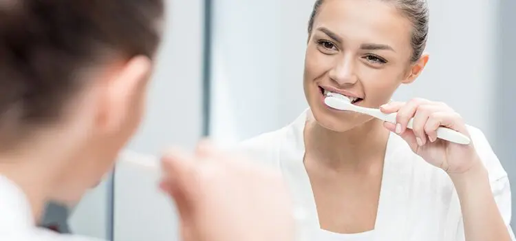 country club dentist perio coconino arizona - person brushing teeth