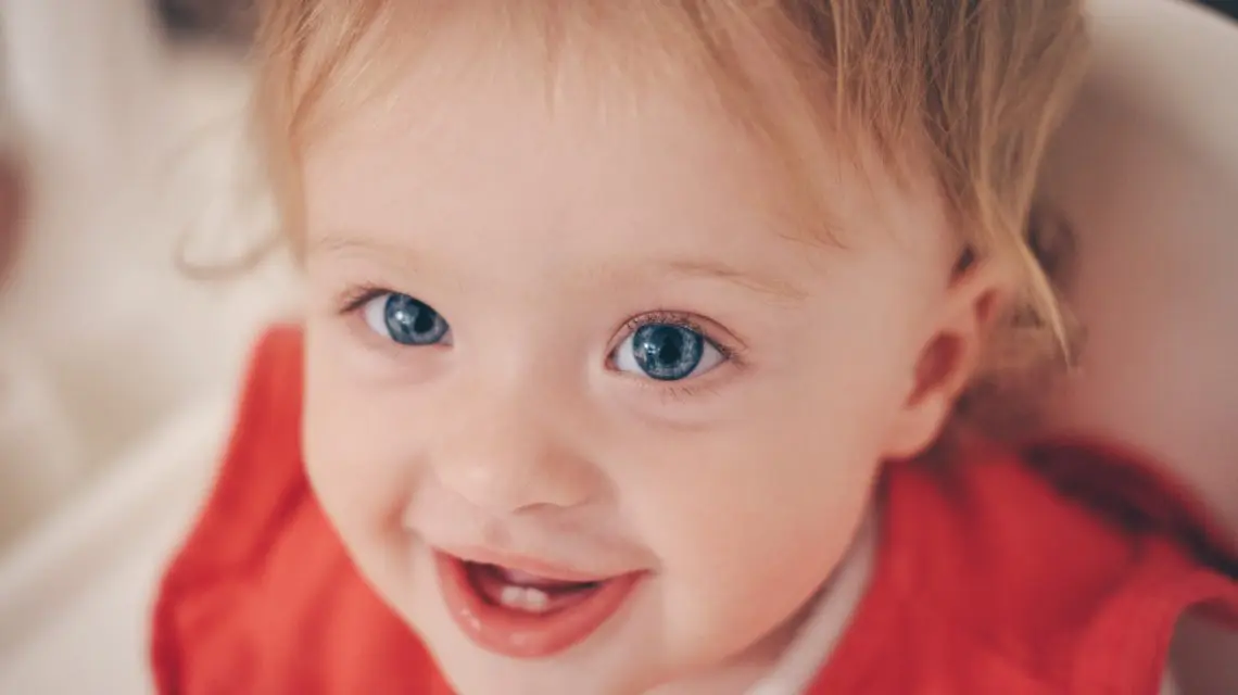 when to start brushing baby teeth - baby smiling