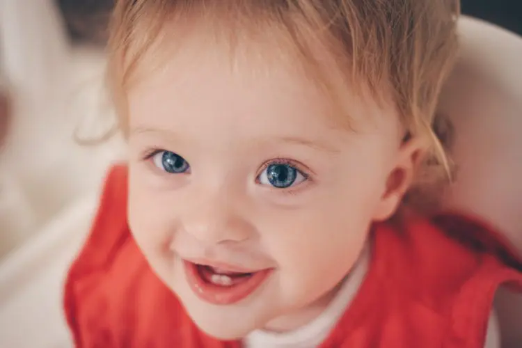 when to start brushing baby teeth - baby smiling