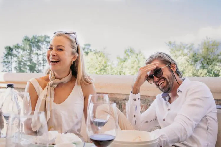 older man and woman laughing