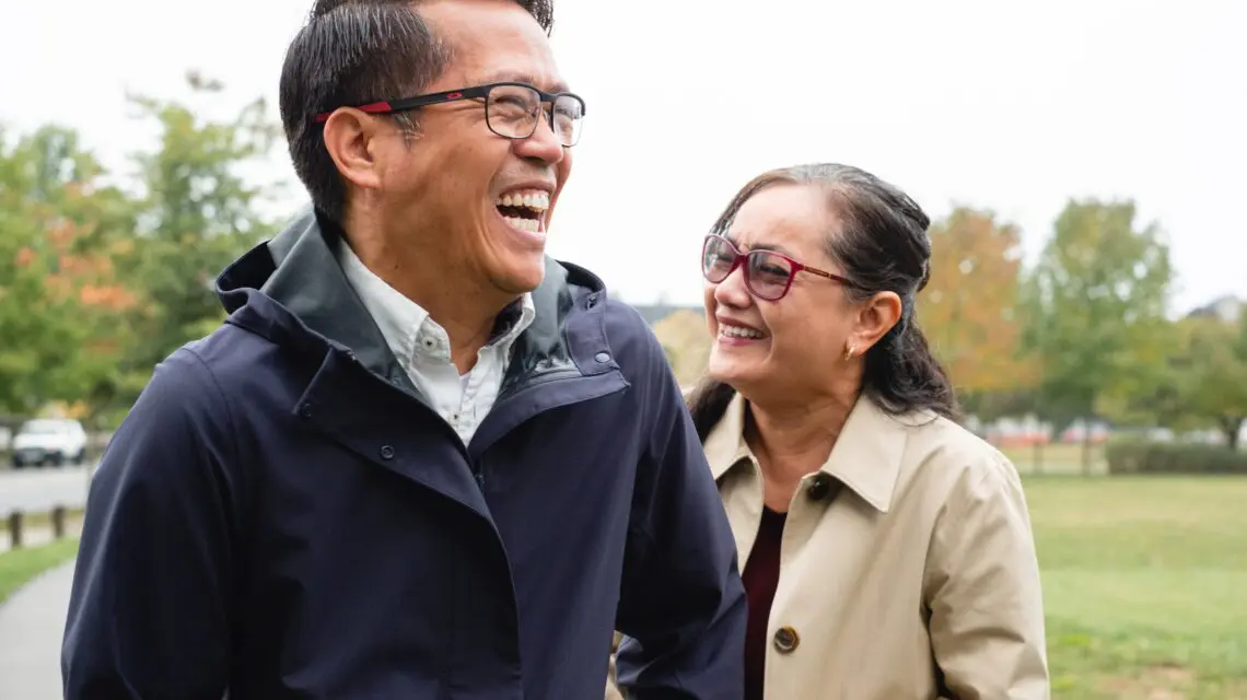 older couple smiling -professional vs. at home teeth whitening