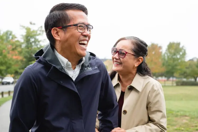 older couple smiling -professional vs. at home teeth whitening