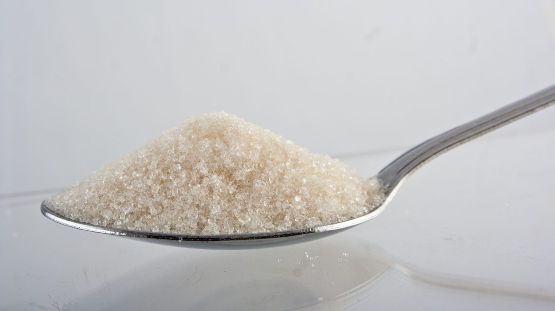 dental benefits of xylitol - spoonful of white granular substance