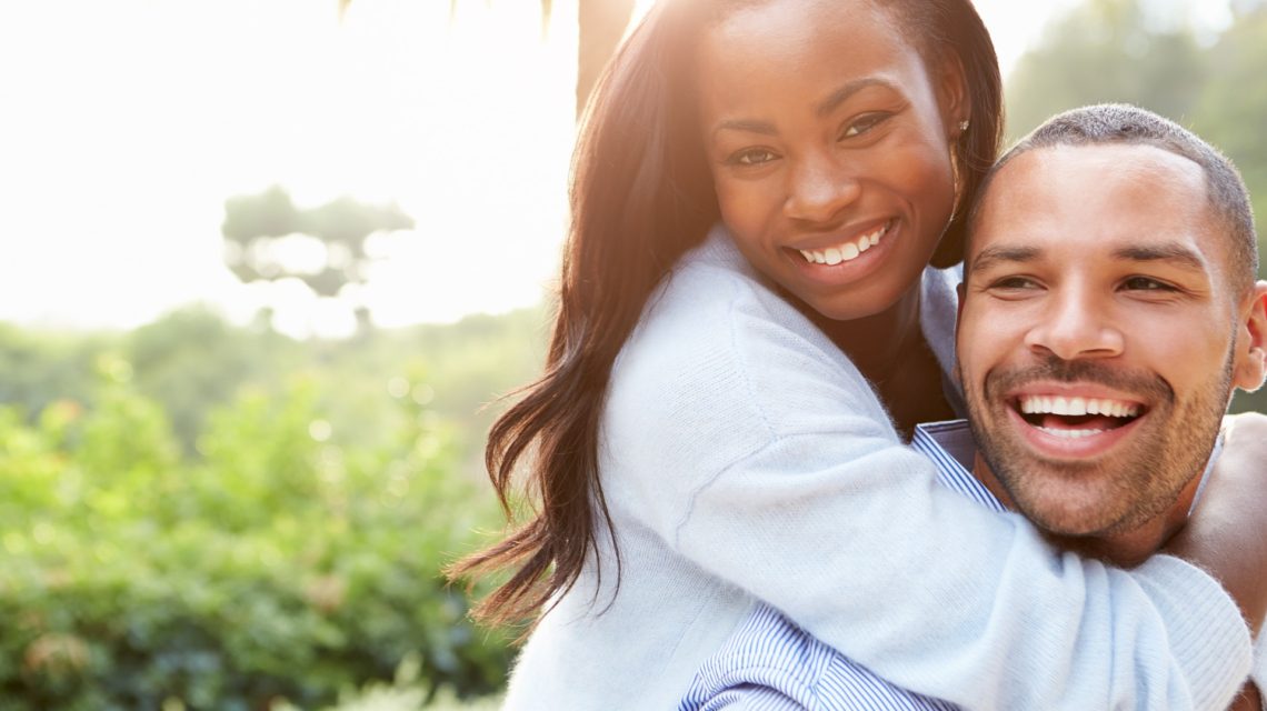 how long do dental veneers last - happy couple