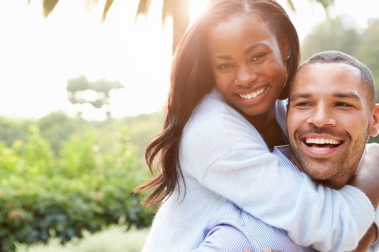 how long do dental veneers last - happy couple