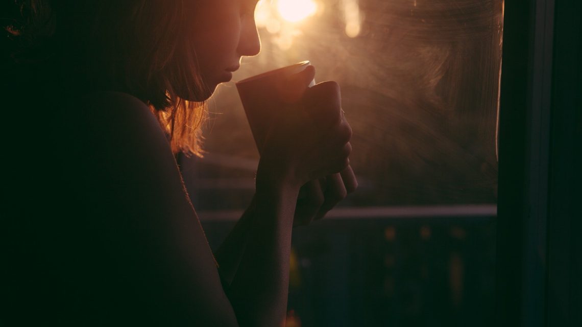 remedies for sensitive teeth - woman drinking tea