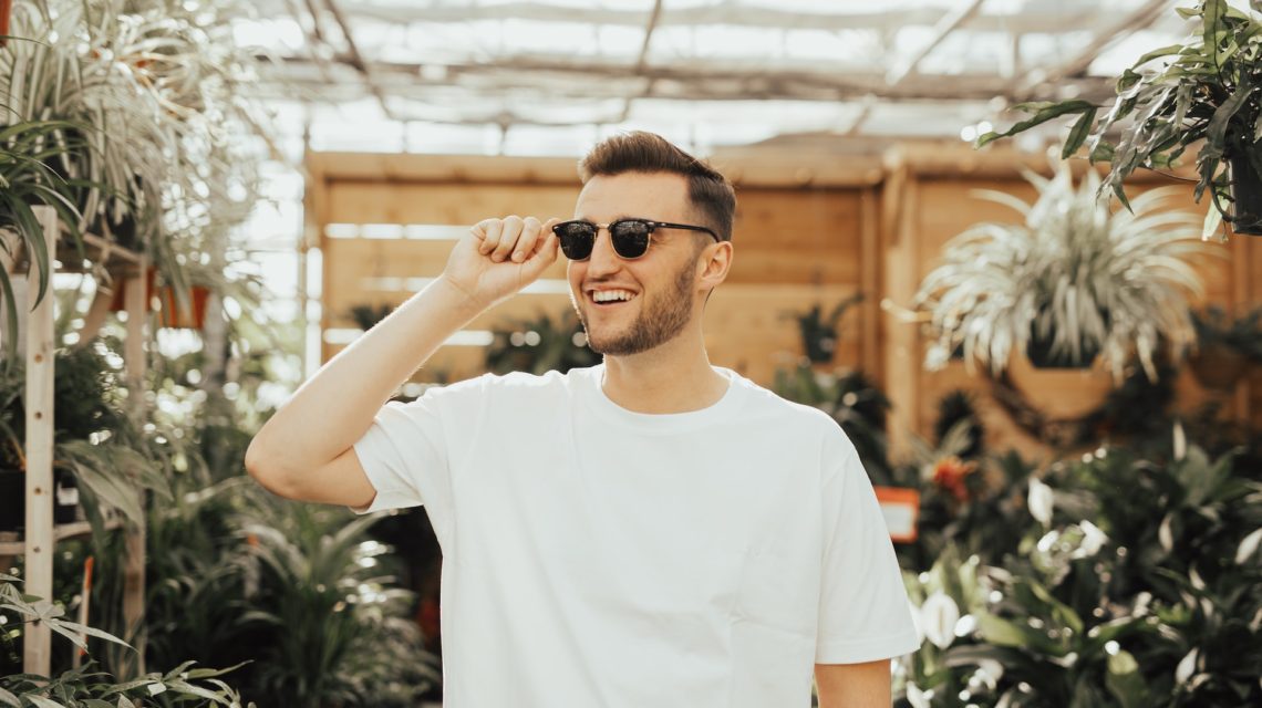 how to keep teeth white - man in sunglasses smiling